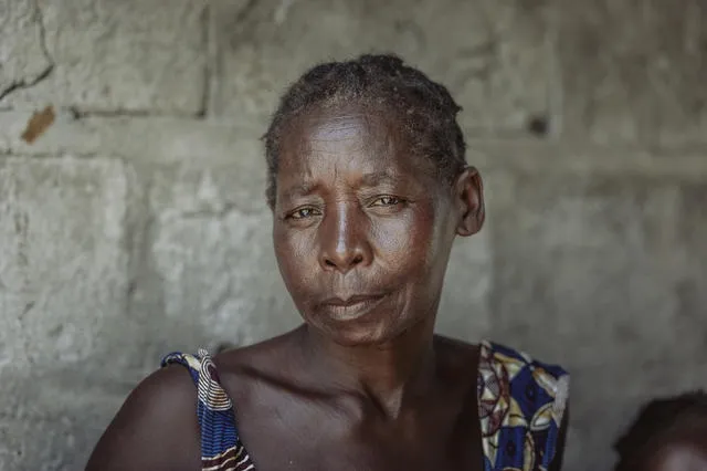 Maria looks into the camera.