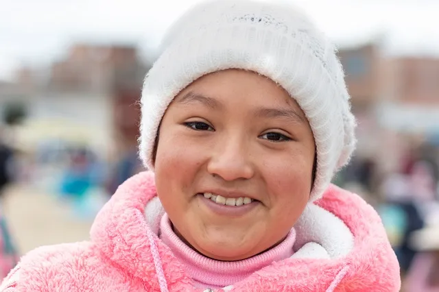 Ana* smiles for the camera