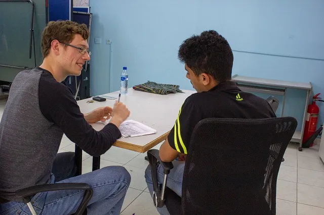 Zaki* and Jake working on homework