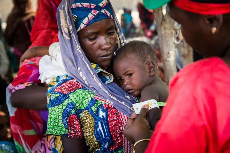 A child being checked for malnutrition