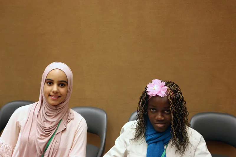 Haneen and Agnes prepare to speak in Geneva at UN