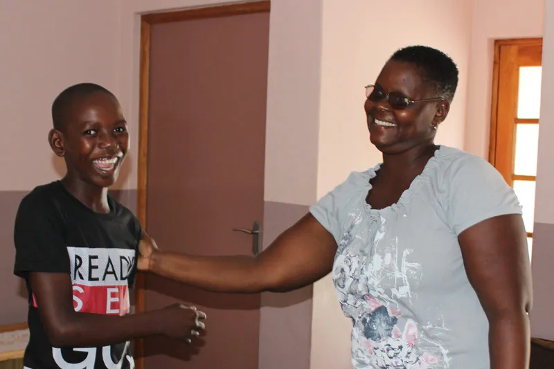 SOS mother Zelia with her son Edricio