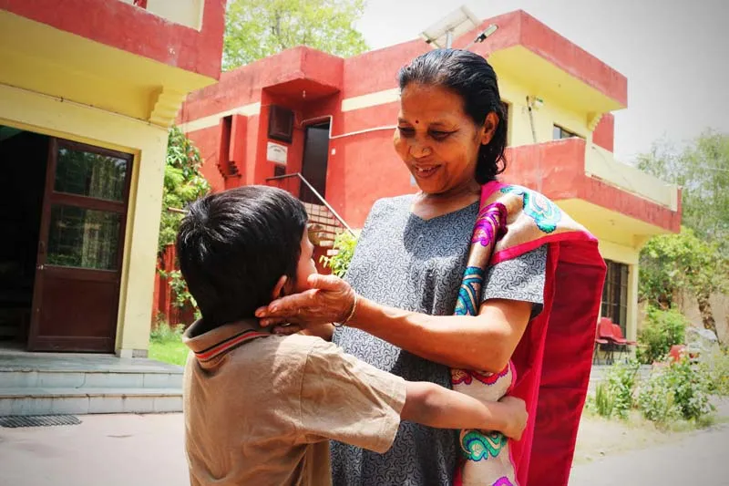 SOS mother and son embracing