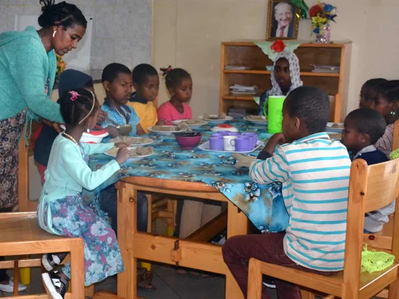 SOS mother feeding her family