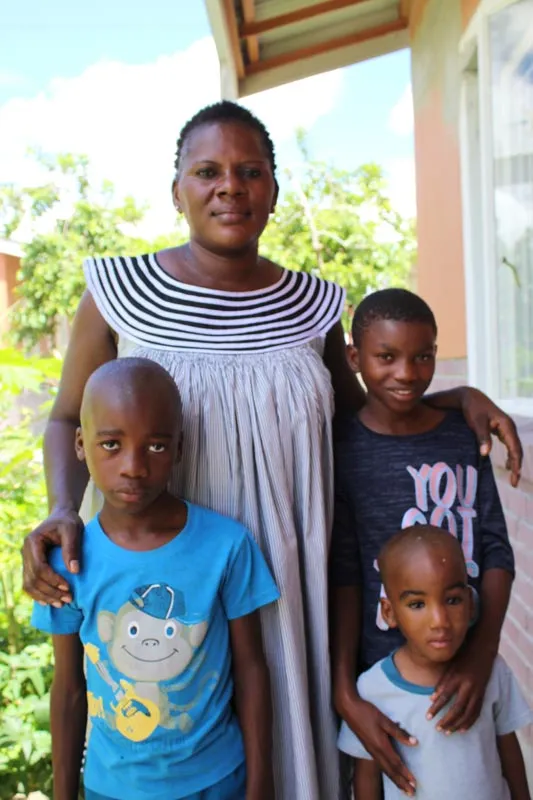 SOS mother Penny with Pius, Veila and Tulela