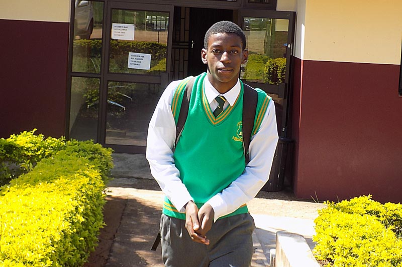 Teenager in school uniform