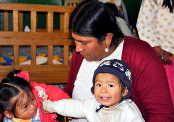 Virginia and her two children - Potosi, Bolivia