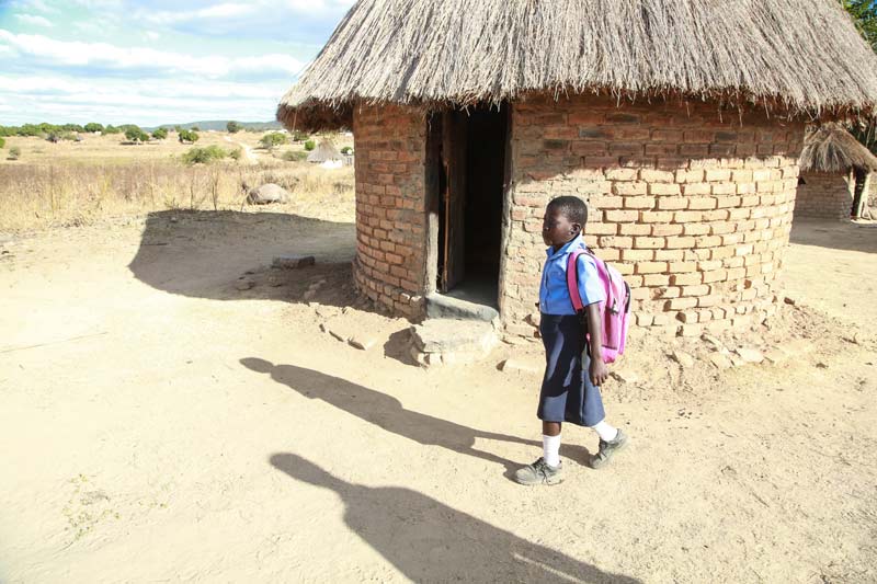 Young woman walking home from school